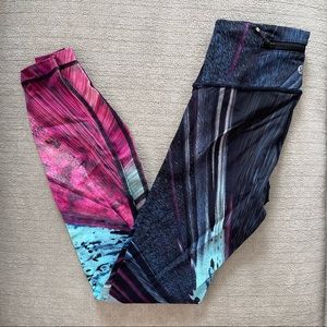 pink, turquoise, and navy patterned Lululemon swift speed high-rise tights 💝
